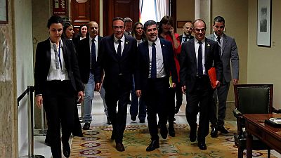 Jailed Catalan separatist MPs pick up credentials amid tight security Jailed Catalan separatist MPs pick up credentials amid tight security