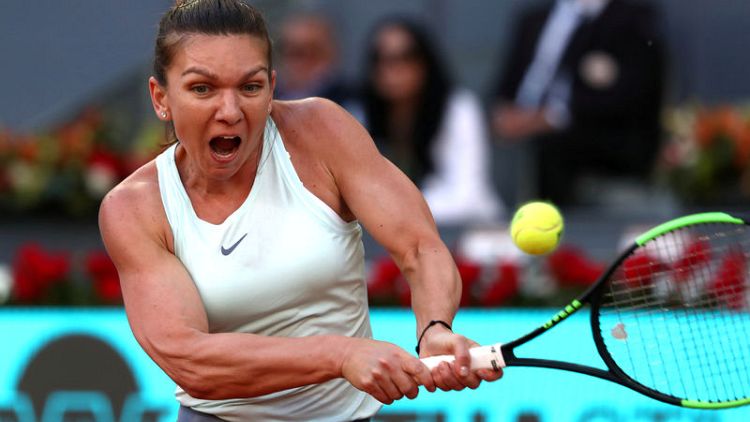 Holder Halep shrugs off expectations ahead of French Open