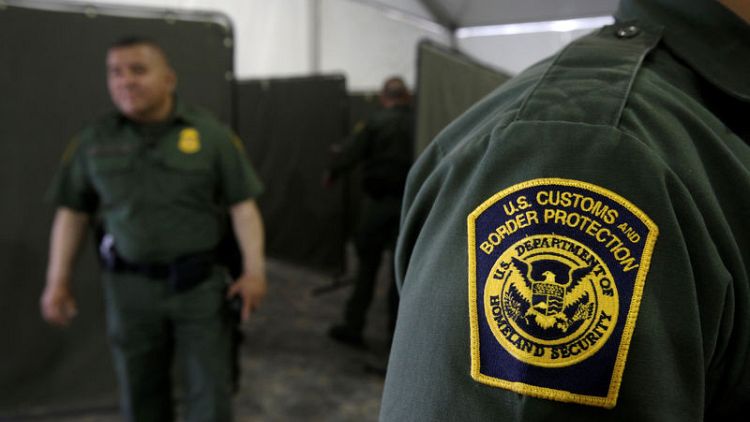 U.S. Border agent accused of calling migrants 'savages' before knocking one over