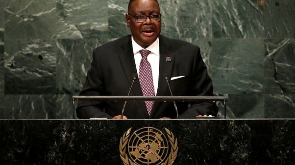 Malawians vote in tough election for President Mutharika Malawians vote in tough election for President Mutharika