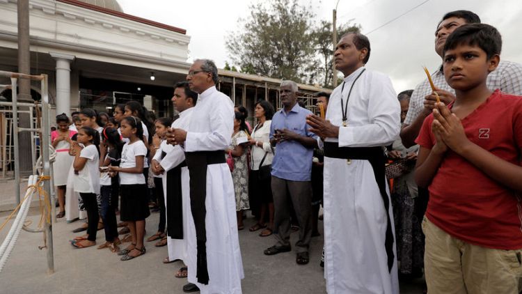 In tearful ceremony, Sri Lanka Catholics mark one month since bombings