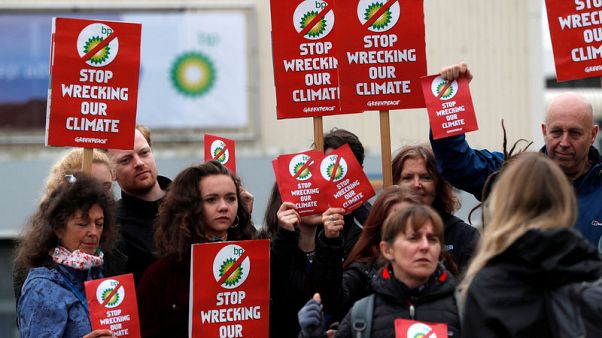 Climate protesters disrupt BP investor meeting, Shell gets boost Climate protesters disrupt BP investor meeting, Shell gets boost