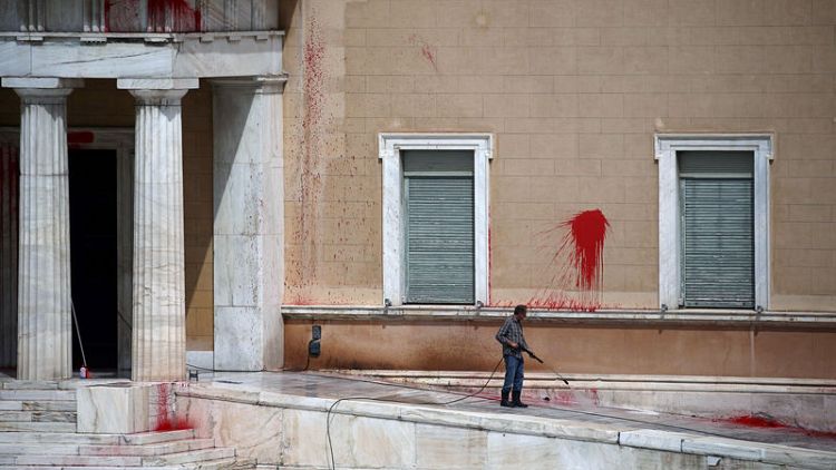Attackers throw red paint at Greece's parliament