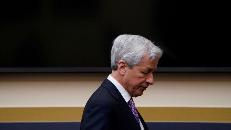 JPMorgan shareholders approve executive pay, fewer votes than last year