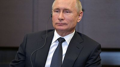 الكرملين: بوتين وميركل وماكرون يبحثون أوكرانيا في اتصال هاتفي