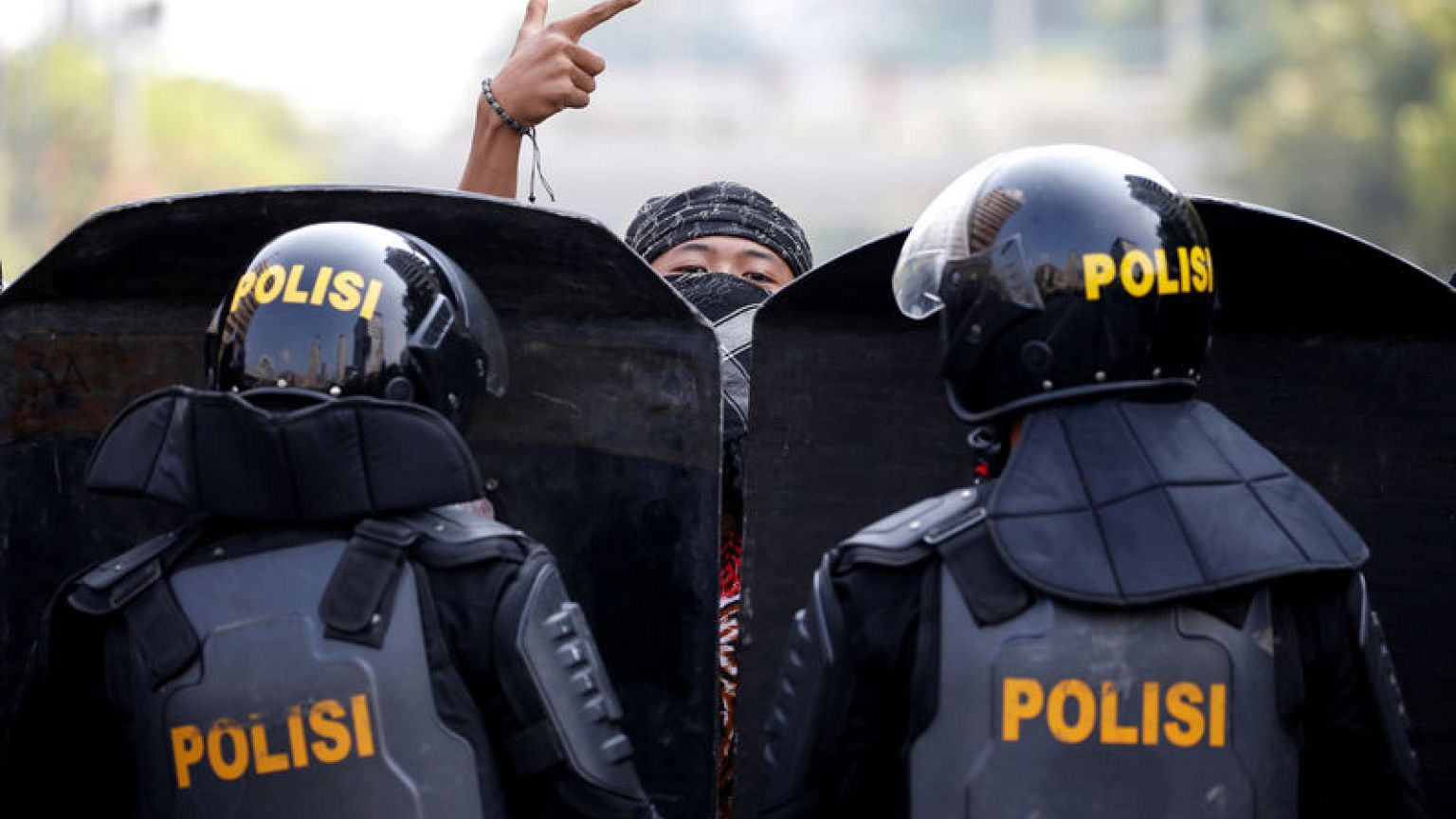 Six die, protests swell as Indonesia plunges into post-election unrest