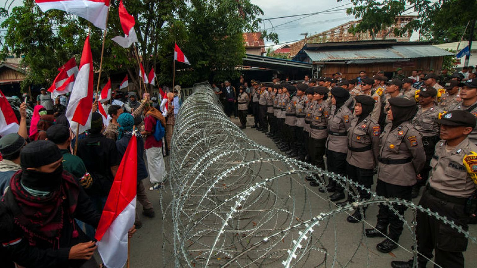 Indonesia curbs social media, blaming hoaxes for inflaming unrest