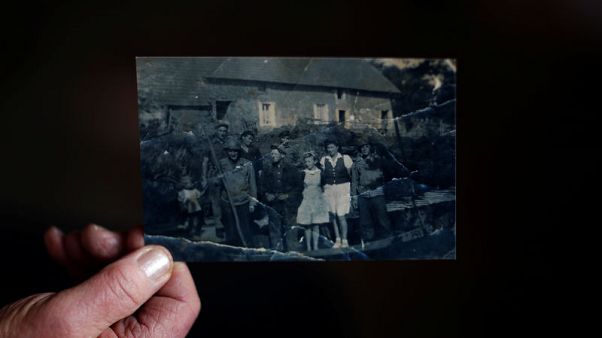 In western France, a village remembers D-Day's "secret massacre" In western France, a village remembers D-Day's "secret massacre"