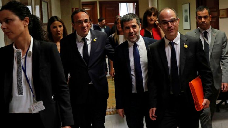 Spanish parliament suspends jailed Catalan leaders' rights as lawmakers