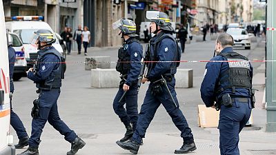 French police hunt suitcase bomber after blast in Lyon