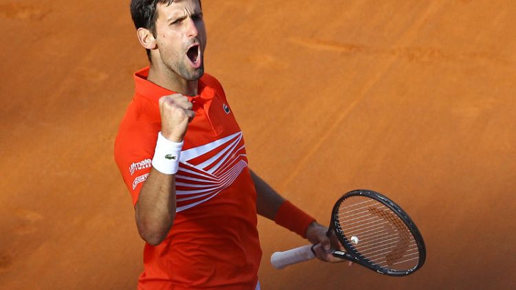 Djokovic ready to fire at Roland Garros as Grand Slam landmark beckons