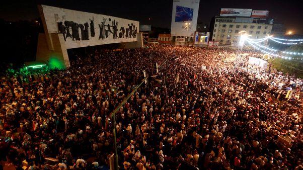 Iraqi protesters urge Baghdad to stay out of U.S.-Iran showdown Iraqi protesters urge Baghdad to stay out of U.S.-Iran showdown