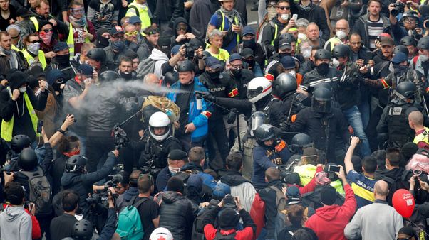 French yellow vest protesters clash with police but numbers wane French yellow vest protesters clash with police but numbers wane
