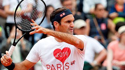 Federer returns on opening day at Roland Garros