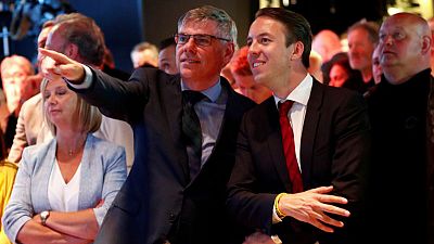 'Under one flag': two Belgiums seek one government after vote