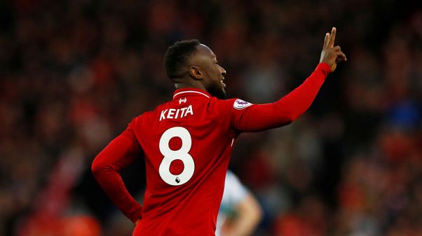 Soccer: Injured Liverpool star in line for Cup of Nations return Soccer: Injured Liverpool star in line for Cup of Nations return