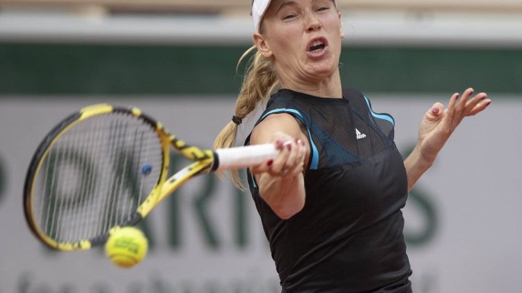 Fragile Wozniacki another top casualty in Paris