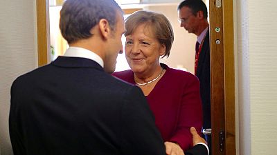 Merkel and Macron spar in EU hunt for 'Mr or Ms Europe'