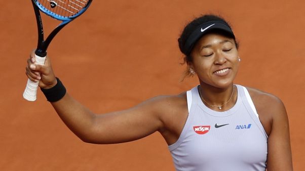 Osaka survives huge first-round scare Osaka survives huge first-round scare