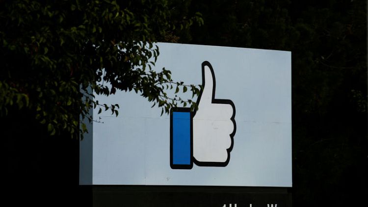 Inflatable angry emoji looms over Facebook annual board meeting
