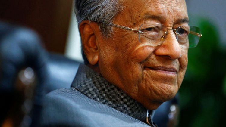 Malaysia's Mahathir proposes common East Asia currency pegged to gold