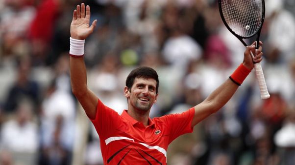 Djokovic breezes into third round in Paris Djokovic breezes into third round in Paris