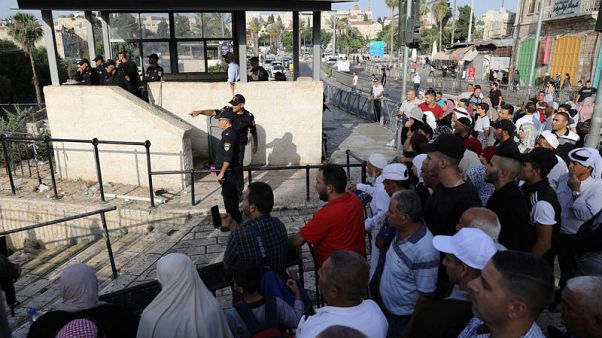 Palestinian stabs Israelis, shot dead by police - spokesman Palestinian stabs Israelis, shot dead by police - spokesman