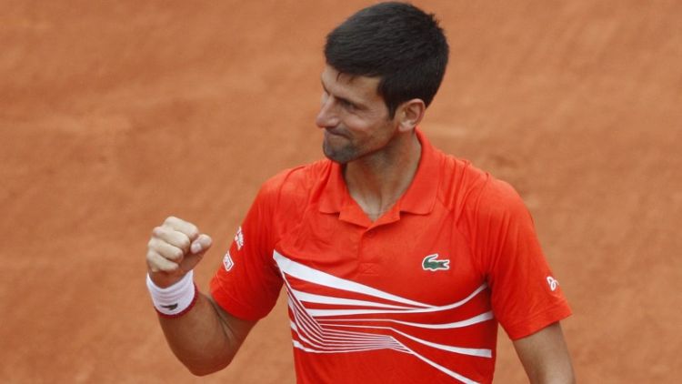Djokovic reaches 10th successive French Open quarter-final