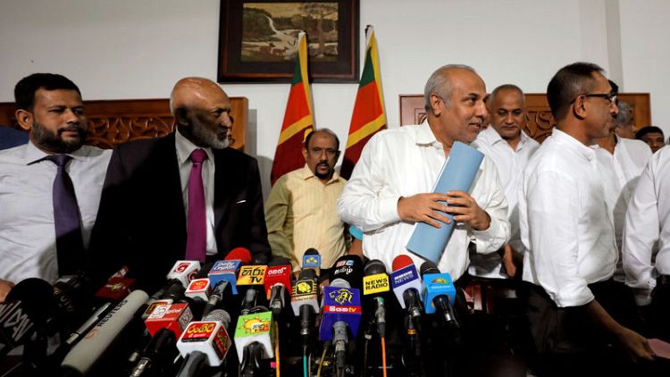 Sri Lanka Muslim officials quit in solidarity with minister accused of Islamist ties