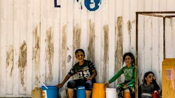 Syrie: des centaines de femmes et enfants du camp d'Al-Hol rentrent chez eux Syrie: des centaines de femmes et enfants du camp d'Al-Hol rentrent chez eux