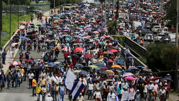 Protesters return to streets in Honduras, despite president's concessions