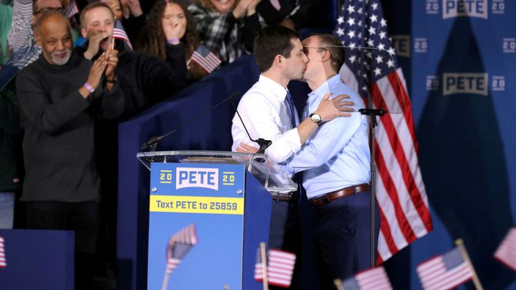 Democrat Buttigieg discusses being part of first gay couple in the White House