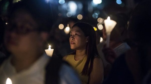 Des Hongkongais commémorent Tiananmen, inquiets pour leurs propres libertés Des Hongkongais commémorent Tiananmen, inquiets pour leurs propres libertés