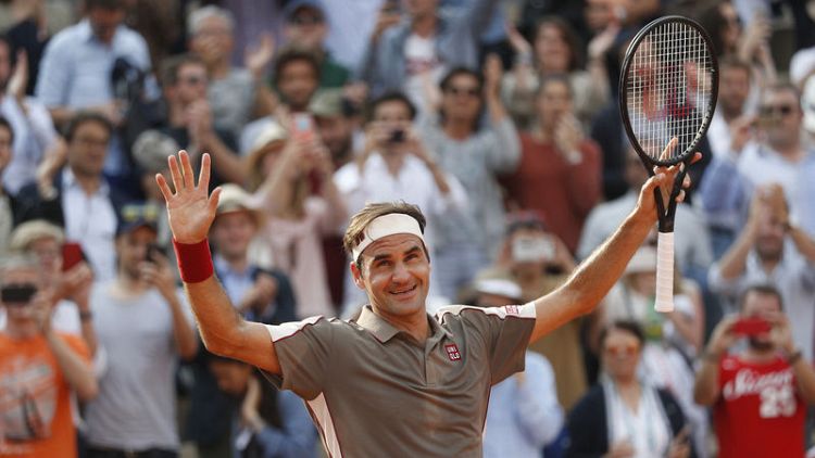 Federer subdues Wawrinka in Swiss classic