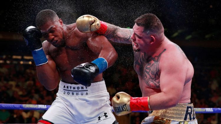 Joshua's promoter says he has triggered Ruiz rematch clause