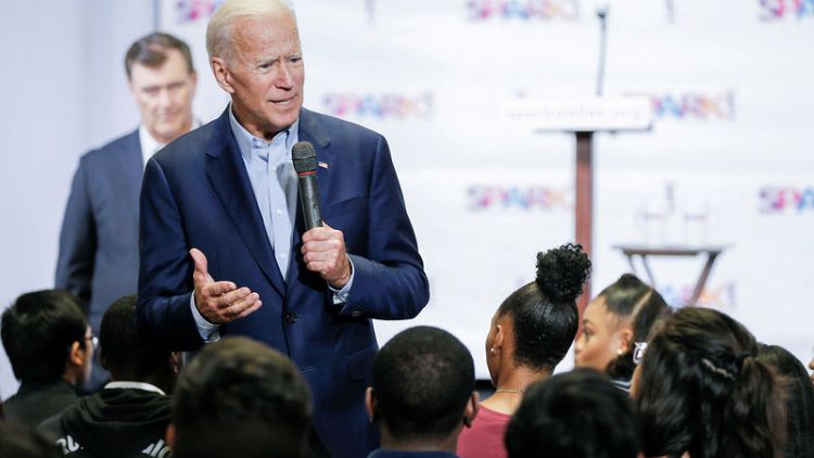 Biden unveils climate plan, raising corporate taxes to pay for investment