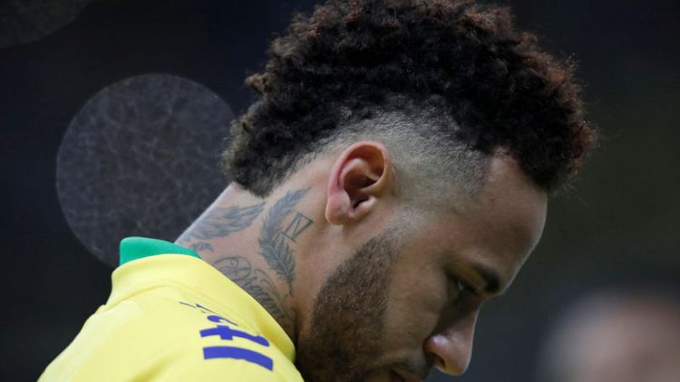 Brazil's Neymar limps off injured in win over Qatar