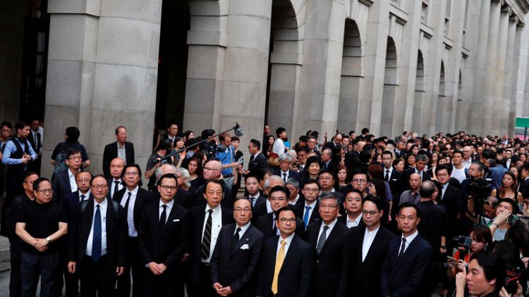Hong Kong lawyers protest "polarising" extradition bill in rare march