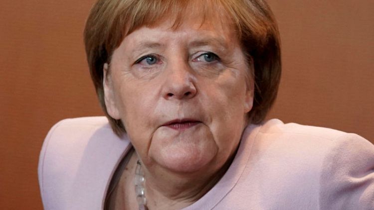 German Greens explore leftist state alliance, in warning to Merkel