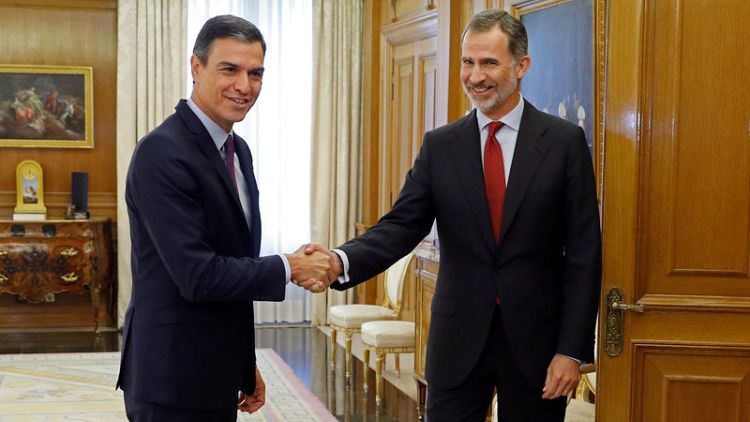 Spain's king invites Sanchez to seek parliamentary vote as PM