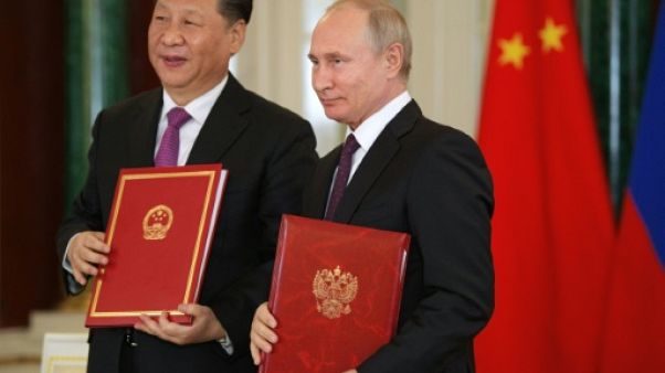 Moscou et Pékin affichent leur entente au grand rendez-vous russe des affaires Moscou et Pékin affichent leur entente au grand rendez-vous russe des affaires