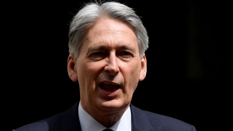 Decarbonising UK economy will cost £1 trillion, cannot be delayed - Hammond