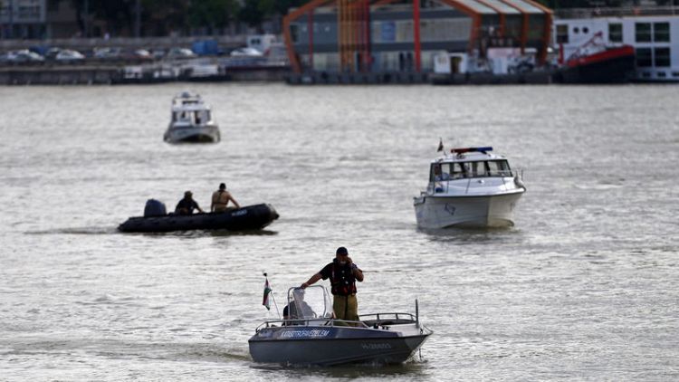 Most victims found in Hungary boat crash, search continues
