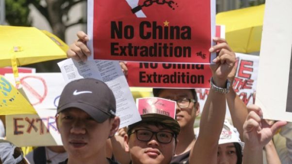Hong Kong maintient son projet de loi d'extraditions malgré les manifestations Hong Kong maintient son projet de loi d'extraditions malgré les manifestations
