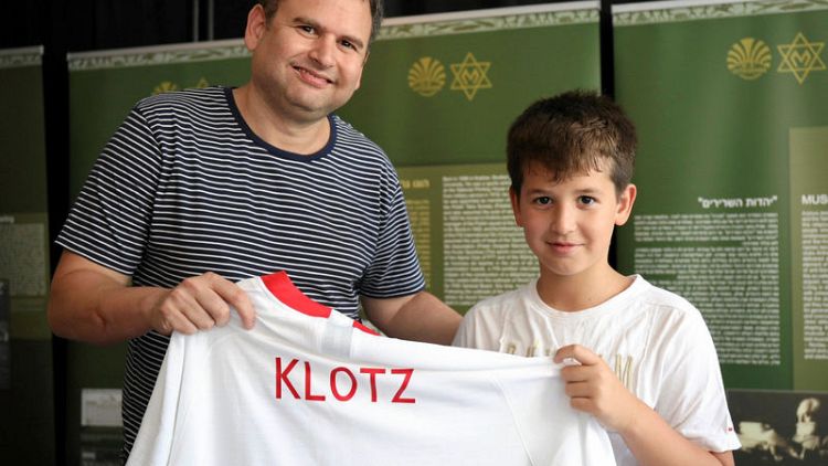 Poland honours national soccer player murdered in Holocaust