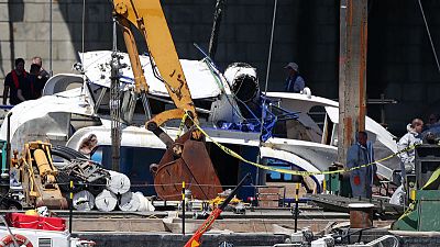 Four bodies found as salvage crews lift capsized Hungarian boat Four bodies found as salvage crews lift capsized Hungarian boat