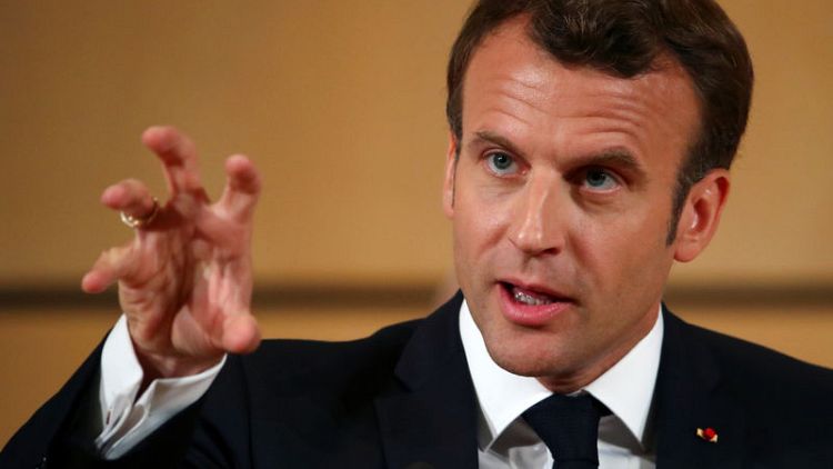World must not 'sleepwalk' into war, Macron says in speech on reforming capitalism