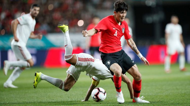 Kim own goal earns Wilmots' Iran draw with Koreans