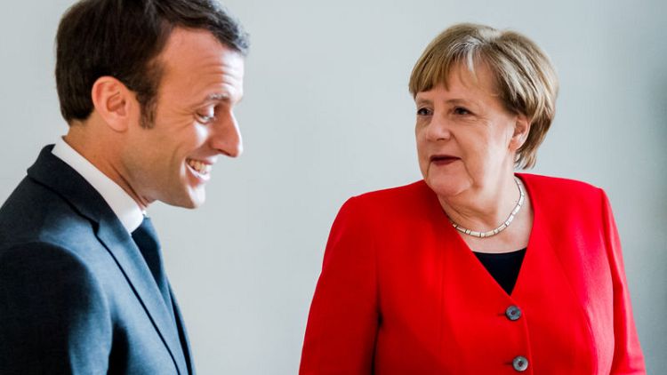 Macron says he would back Merkel if she runs for EU leadership