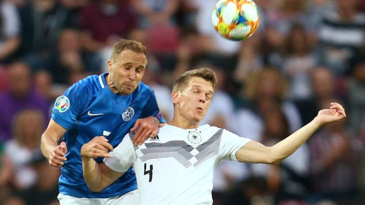 Germany crush Estonia 8-0, Northern Ireland earn late win